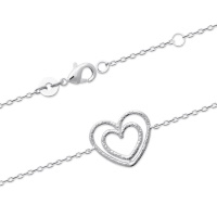 Bracelet composé d'une chaîne et d'un double cœur en argent 925/000 rhodié. Fermoir mousqueton avec anneaux de rappel à 16 et 18 cm.
