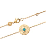 Bracelet en plaqué or et pierre d'imitation turquoise.