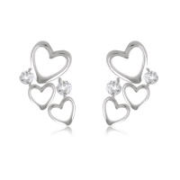 Boucles d'oreilles pendantes composées de trois cœurs en argent 925/000 rhodié serties de deux oxydes de zirconium blancs.
