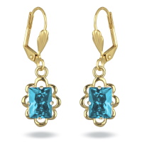 Boucles d'oreilles dormeuses en plaqué or jaune 18 carats et un pendant en pierre synthétique bleue sertie 4 griffes.