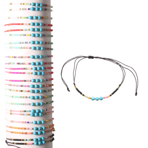 Bracelet fantaisie composé d'un cordon de couleur, de perles miyuki multicolores et de perles en turquoise d'imitation. 10 coloris différents. Vendu à l'unité. Votre préférence en commentaire.