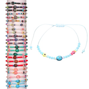 Bracelet fantaisie composé d'un cordon de couleur, de perles multicolores, des perles œil de Turquie et d'une pierre ovale de couleur. 8 coloris différents. Vendu à l'unité. Votre préférence en commentaire.