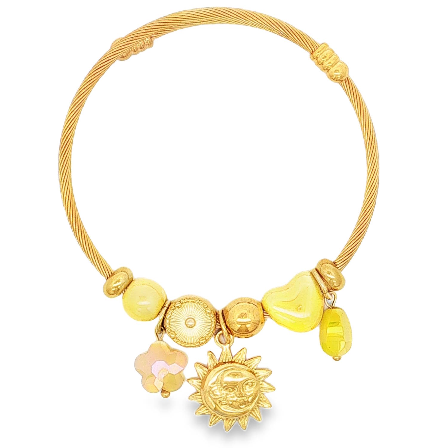Ce magnifique bracelet de style jonc rigide se distingue par son design à la fois poétique et lumineux, décliné dans une éclatante teinte dorée.<br/>Le corps du bracelet est formé par un câble en acier torsadé, offrant à la fois robustesse, flexibilité et une texture élégante. Deux bagues d'arrêt travaillées encadrent la partie supérieure pour structurer le bijou.<br/>La partie inférieure du bracelet accueille une sélection harmonieuse de perles et de breloques coulissantes.<br/>Une superbe breloque représentant un soleil rayonnant avec un visage sculpté, symbole de chaleur et de lumière.<br/>Une petite fleur délicate aux reflets légèrement nacrés ou irisés, suspendue à côté du soleil.<br/>L'ensemble est rythmé par une alternance de perles dorées lisses, d'une perle plate gravée de motifs géométriques, d'un élément jaune asymétrique rappelant la douceur du verre poli, et d'une petite perle jaune facettée suspendue à l'extrémité. Coeur Jonc Rond Soleil Adolescent Adulte Amour Femme Fille Fleurs Indémodable Nature Ce magnifique bracelet de style jonc rigide se distingue par son design à la fois poétique et lumineux, décliné dans une éclatante teinte dorée.<br/>Le corps du bracelet est formé par un câble en acier torsadé, offrant à la fois robustesse, flexibilité et une texture élégante. Deux bagues d'arrêt travaillées encadrent la partie supérieure pour structurer le bijou.<br/>La partie inférieure du bracelet accueille une sélection harmonieuse de perles et de breloques coulissantes.<br/>Une superbe breloque représentant un soleil rayonnant avec un visage sculpté, symbole de chaleur et de lumière.<br/>Une petite fleur délicate aux reflets légèrement nacrés ou irisés, suspendue à côté du soleil.<br/>L'ensemble est rythmé par une alternance de perles dorées lisses, d'une perle plate gravée de motifs géométriques, d'un élément jaune asymétrique rappelant la douceur du verre poli, et d'une petite perle jaune facettée suspendue à l'extrémité. Coeur Jonc Rond Soleil Adolescent Adulte Amour Femme Fille Fleurs Indémodable Nature