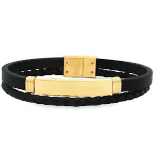 Ce bracelet jonc sophistiqué associe l'élégance du cuir noir à l'éclat chaleureux d'éléments dorés. Un design moderne et épuré, idéal pour ajouter une touche distinctive à votre style. Sa conception soignée en fait un accessoire à la fois robuste et raffiné.