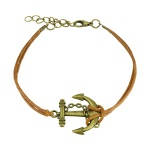 Bracelet fantaisie en textile et métal doré vieilli.