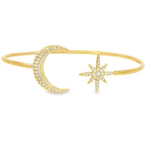Ce bracelet jonc en acier inoxydable doré capture l'éclat céleste avec son design unique. Orné de strass, il présente une lune et une étoile scintillantes. Une composition délicate et raffinée, idéale pour ajouter une touche de magie à votre allure.
