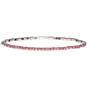 Bracelet fantaisie élastique en métal argenté et strass en cristaux synthétiques de couleur rose.
