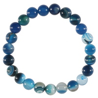 Bracelet boules élastique de perles en pierre naturelle de couleur bleue.