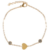 Bracelet composé d'une chaîne avec un cœur en acier doré et de deux cristaux sertis clos. Fermoir mousqueton avec 3 cm de rallonge.
