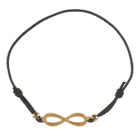 Bracelet fantaisie composé d'un cordon élastique en coton de couleur noir et d'un symbole infini en métal doré.