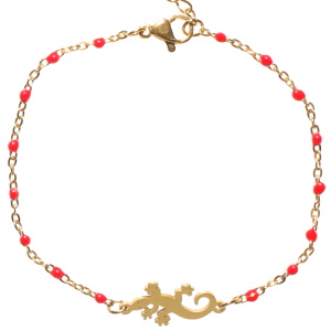 Bracelet composé d'une chaîne en acier doré avec perles en émail de couleur rouge et d'une salamandre en acier doré. Fermoir mousqueton avec 3 cm de  rallonge.