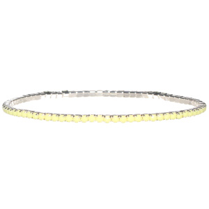 Bracelet fantaisie élastique en métal argenté avec strass de couleur jaune serti griffes.