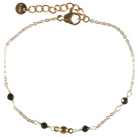 Bracelet composé d'une chaîne en acier doré et quatre perles rondes de couleur. Fermoir mousqueton avec une rallonge de 3 cm.