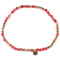 Bracelet élastique composé de perles en acier doré et de perles en pierre de couleur rouge.