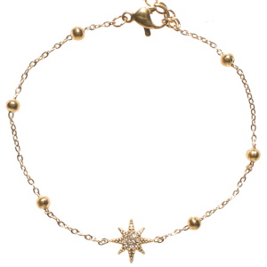 Bracelet composé d'une chaîne en acier doré et d'une étoile sertie de strass. Fermoir mousqueton avec 4 cm de rallonge.
