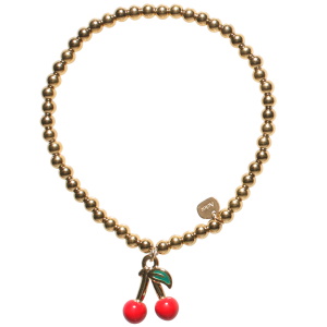 Bracelet élastique composé d'une chaîne boules en acier doré avec un pendant en forme de cerises pavées d'émail de couleur.