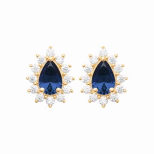 Boucles d'oreilles en plaqué or jaune 18 carats surmontées d'un oxyde de zirconium bleu serti griffes en forme de goutte entouré d'oxydes de zirconium blancs.