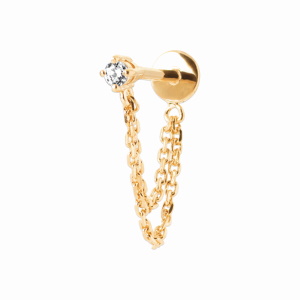 Piercing avec deux chaînettes en plaqué or jaune 18 carats serti griffes d'un oxyde de zirconium blanc et une tige en titane. Vendu à l'unité.