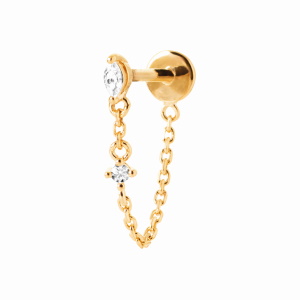 Piercing avec deux chaînettes en plaqué or jaune 18 carats serti griffes d'un oxyde de zirconium blanc et une tige en titane. Vendu à l'unité.