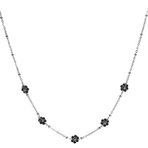 Collier composé d'une chaîne en acier argenté avec des fleurs de perles de couleur noire. Fermoir mousqueton avec 5 cm de rallonge.