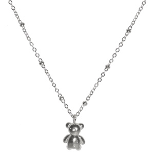 Collier composé d'une chaîne et d'un pendentif en forme de nounours en acier argenté. Fermoir mousqueton avec 5 cm de rallonge.