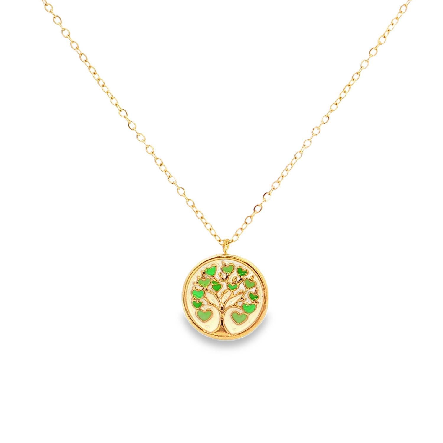 Ce superbe collier allie la symbolique intemporelle de la nature à un design moderne et coloré.<br/>Le point central de cette pièce est un médaillon circulaire finement travaillé, présentant une interprétation poétique de l'Arbre de Vie.<br/>Les branches s'élèvent avec élégance, se transformant en une multitude de petits cœurs délicats qui font office de feuillage.<br/>Chaque cœur est soigneusement rempli d'émail dans un dégradé de nuances vertes. Ce contraste entre le doré et le vert apporte une luminosité unique au bijou.<br/>Le motif repose sur un lit d'émail ivoire, offrant une luminosité douce qui met en valeur la structure de l'arbre.<br/>Un mousqueton sécurisé accompagné d'une chaînette d'extension, permettant d'ajuster parfaitement la taille à votre morphologie. Arbre Rond Adolescent Adulte Eté Femme Fille Nature Printemps Symboles Ce superbe collier allie la symbolique intemporelle de la nature à un design moderne et coloré.<br/>Le point central de cette pièce est un médaillon circulaire finement travaillé, présentant une interprétation poétique de l'Arbre de Vie.<br/>Les branches s'élèvent avec élégance, se transformant en une multitude de petits cœurs délicats qui font office de feuillage.<br/>Chaque cœur est soigneusement rempli d'émail dans un dégradé de nuances vertes. Ce contraste entre le doré et le vert apporte une luminosité unique au bijou.<br/>Le motif repose sur un lit d'émail ivoire, offrant une luminosité douce qui met en valeur la structure de l'arbre.<br/>Un mousqueton sécurisé accompagné d'une chaînette d'extension, permettant d'ajuster parfaitement la taille à votre morphologie. Arbre Rond Adolescent Adulte Eté Femme Fille Nature Printemps Symboles
