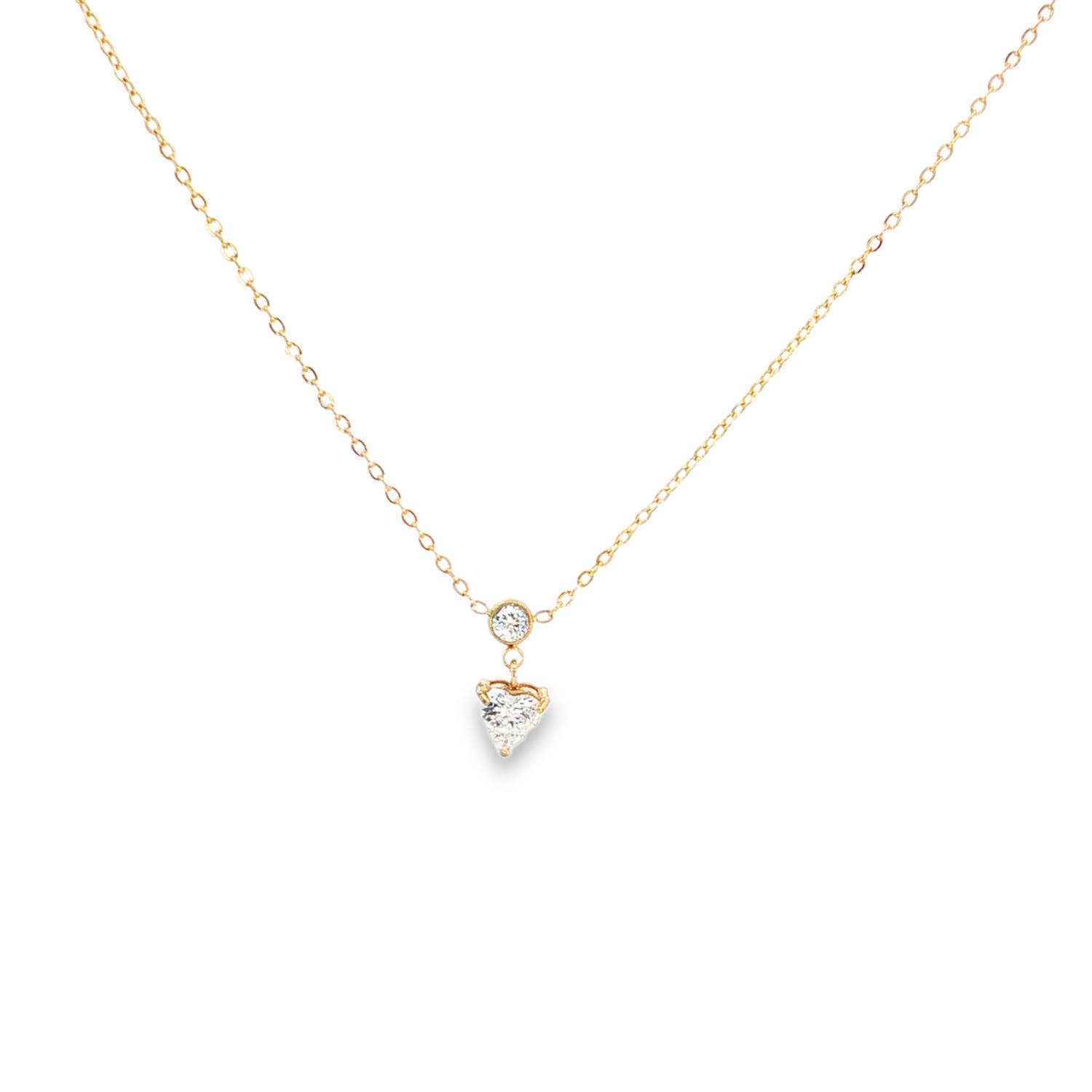 Ce magnifique collier en acier inoxydable doré allie finesse, romantisme et modernité. Son design minimaliste et délicat en fait le bijou idéal à porter au quotidien ou pour sublimer une tenue de soirée.<br/>La pièce maîtresse se compose d'un double motif articulé qui apporte du mouvement au bijou.<br/>Un petit strass rond en oxyde de zirconium, enserré dans un serti clos en acier, est directement intégré au centre de la chaîne.<br/>Suspendu juste en dessous par un fin anneau de jonction, un oxyde de zirconium taillé en forme de cœur constitue le point focal du collier. La pierre est maintenue par un serti à griffes discret qui maximise sa brillance et sa réfraction à la lumière.<br/>Un mousqueton sécurisé accompagné d'une chaînette d'extension, permettant d'ajuster parfaitement la taille à votre morphologie. Coeur Solitaire Strass Adolescent Adulte Amour Femme Fille Indémodable Ce magnifique collier en acier inoxydable doré allie finesse, romantisme et modernité. Son design minimaliste et délicat en fait le bijou idéal à porter au quotidien ou pour sublimer une tenue de soirée.<br/>La pièce maîtresse se compose d'un double motif articulé qui apporte du mouvement au bijou.<br/>Un petit strass rond en oxyde de zirconium, enserré dans un serti clos en acier, est directement intégré au centre de la chaîne.<br/>Suspendu juste en dessous par un fin anneau de jonction, un oxyde de zirconium taillé en forme de cœur constitue le point focal du collier. La pierre est maintenue par un serti à griffes discret qui maximise sa brillance et sa réfraction à la lumière.<br/>Un mousqueton sécurisé accompagné d'une chaînette d'extension, permettant d'ajuster parfaitement la taille à votre morphologie. Coeur Solitaire Strass Adolescent Adulte Amour Femme Fille Indémodable