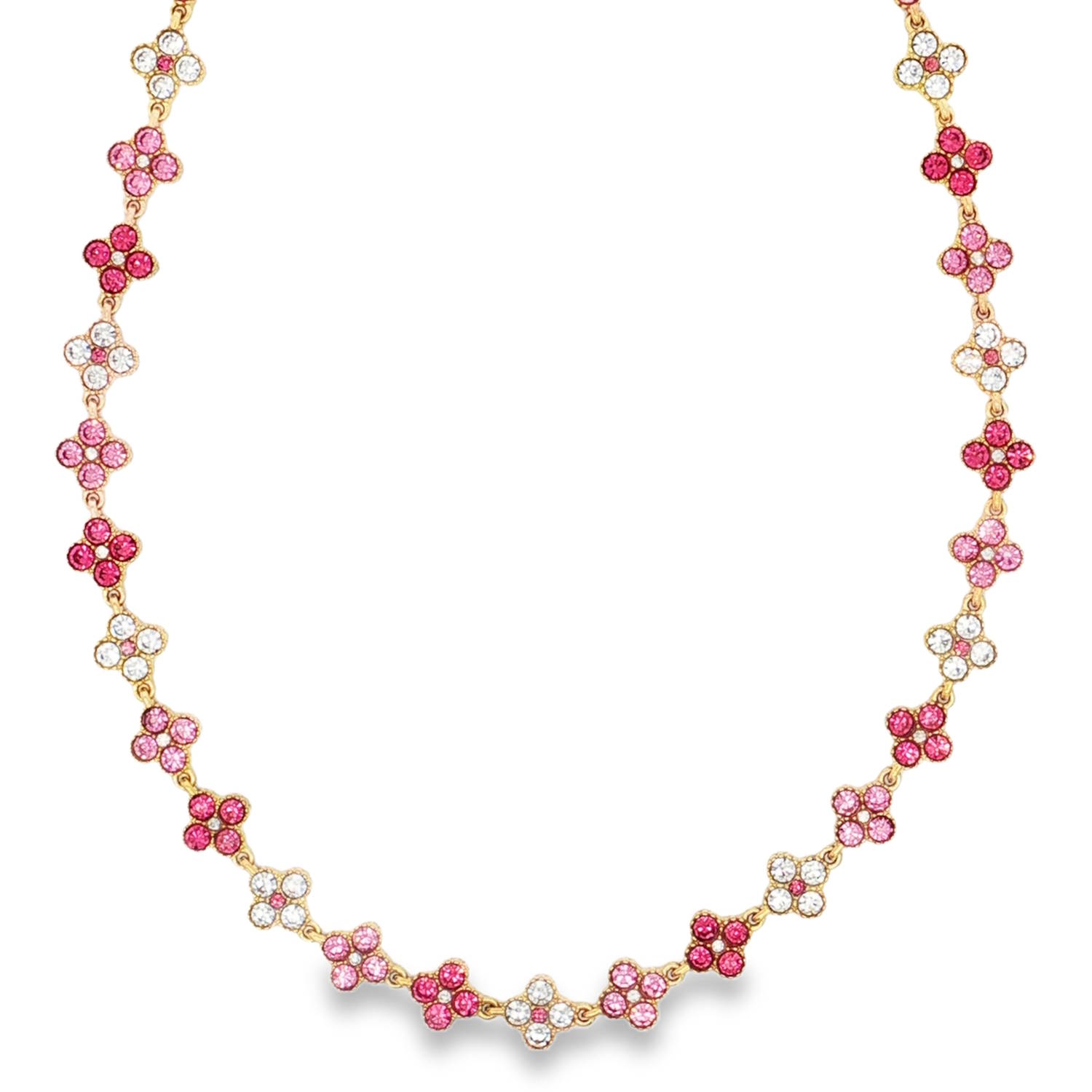 Ce collier raffiné en acier inoxydable doré allie délicatesse florale et éclat moderne. Son design structuré en fait une pièce maîtresse pour illuminer le décolleté avec une touche de romantisme.<br/>Le collier est composé d'une succession de charms en forme de fleurs à quatre pétales (trèfles), symbolisant la chance et la féminité.<br/>Une alternance harmonieuse de cristaux blanc pur, rose poudré et rose fuchsia. Ce dégradé de couleurs apporte du relief et une allure pétillante au bijou.<br/>L'acier doré offre une brillance chaleureuse qui sublime l'éclat des pierres serties.<br/>Un mousqueton sécurisé accompagné d'une chaînette d'extension, permettant d'ajuster parfaitement la taille à votre morphologie. Strass Trèfle Adolescent Adulte Femme Fille Fleurs Indémodable Nature Ce collier raffiné en acier inoxydable doré allie délicatesse florale et éclat moderne. Son design structuré en fait une pièce maîtresse pour illuminer le décolleté avec une touche de romantisme.<br/>Le collier est composé d'une succession de charms en forme de fleurs à quatre pétales (trèfles), symbolisant la chance et la féminité.<br/>Une alternance harmonieuse de cristaux blanc pur, rose poudré et rose fuchsia. Ce dégradé de couleurs apporte du relief et une allure pétillante au bijou.<br/>L'acier doré offre une brillance chaleureuse qui sublime l'éclat des pierres serties.<br/>Un mousqueton sécurisé accompagné d'une chaînette d'extension, permettant d'ajuster parfaitement la taille à votre morphologie. Strass Trèfle Adolescent Adulte Femme Fille Fleurs Indémodable Nature