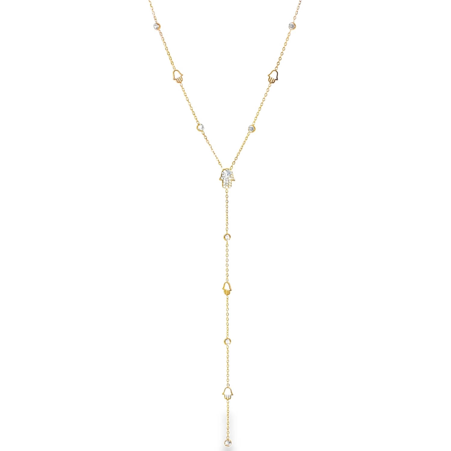 Sublimez votre décolleté avec ce collier de style lariat (en Y), une pièce à la fois spirituelle et résolument moderne. Conçu en acier inoxydable de haute qualité avec une finition dorée éclatante, ce bijou allie durabilité et raffinement.<br/>Ce modèle se distingue par l'accumulation délicate de mains de Fatma (Hamsa), symbole ancestral de protection et de chance.<br/>Une main de Fatma plus généreuse, entièrement pavée de cristaux scintillants, sert de jonction élégante d'où s'écoule la fine chaîne pendante.<br/>Le long de la maille forçat, alternent de petites mains stylisées en acier poli et des cristaux en serti clos, apportant des touches de lumière à chaque mouvement.<br/>Un mousqueton sécurisé accompagné d'une chaînette d'extension, permettant d'ajuster parfaitement la taille à votre morphologie. Main Rond Strass Adolescent Adulte Femme Fille Indémodable Symboles Sublimez votre décolleté avec ce collier de style lariat (en Y), une pièce à la fois spirituelle et résolument moderne. Conçu en acier inoxydable de haute qualité avec une finition dorée éclatante, ce bijou allie durabilité et raffinement.<br/>Ce modèle se distingue par l'accumulation délicate de mains de Fatma (Hamsa), symbole ancestral de protection et de chance.<br/>Une main de Fatma plus généreuse, entièrement pavée de cristaux scintillants, sert de jonction élégante d'où s'écoule la fine chaîne pendante.<br/>Le long de la maille forçat, alternent de petites mains stylisées en acier poli et des cristaux en serti clos, apportant des touches de lumière à chaque mouvement.<br/>Un mousqueton sécurisé accompagné d'une chaînette d'extension, permettant d'ajuster parfaitement la taille à votre morphologie. Main Rond Strass Adolescent Adulte Femme Fille Indémodable Symboles