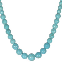 collier composé d'un cordon avec perles boules en pierre d'imitation turquoise. Fermoir mousqueton en acier argenté.