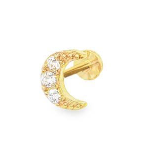 Piercing en forme de croissant de lune en acier chirurgical doré serti de strass.