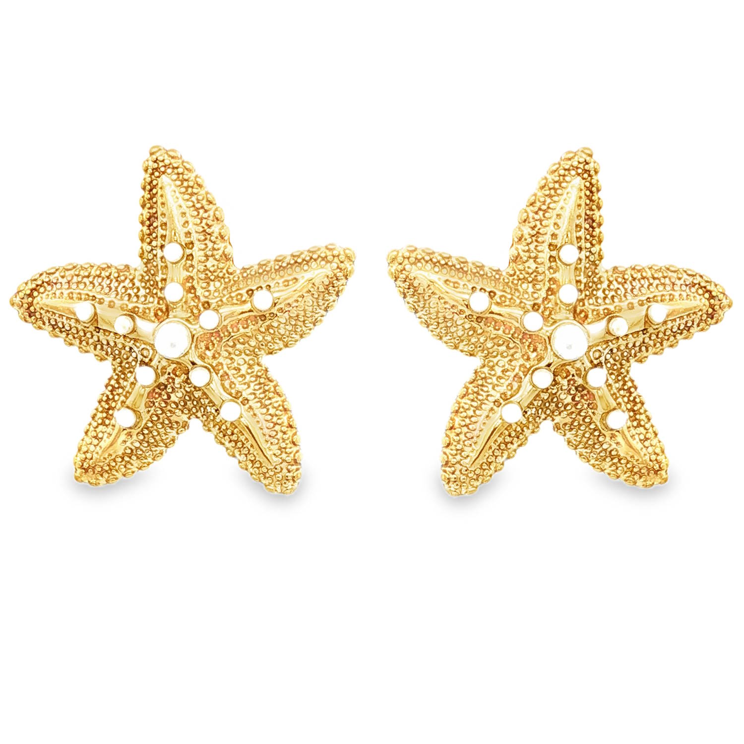 Succombez au charme de l'océan avec cette magnifique paire de boucles d'oreilles en forme d'étoiles de mer. Conçues en acier de haute qualité, elles allient la robustesse d'un métal durable à l'élégance d'un design finement travaillé.<br/>La surface est minutieusement travaillée avec un effet perlé et texturé qui rappelle fidèlement le relief naturel des étoiles de mer.<br/>Le cœur et les branches de chaque étoile sont délicatement ajourés et ornés de petites perles éclatantes, apportant une touche de lumière subtile à votre visage. Etoile Perle Puce Adolescent Adulte Animaux Femme Fille Indémodable Nature Succombez au charme de l'océan avec cette magnifique paire de boucles d'oreilles en forme d'étoiles de mer. Conçues en acier de haute qualité, elles allient la robustesse d'un métal durable à l'élégance d'un design finement travaillé.<br/>La surface est minutieusement travaillée avec un effet perlé et texturé qui rappelle fidèlement le relief naturel des étoiles de mer.<br/>Le cœur et les branches de chaque étoile sont délicatement ajourés et ornés de petites perles éclatantes, apportant une touche de lumière subtile à votre visage. Etoile Perle Puce Adolescent Adulte Animaux Femme Fille Indémodable Nature