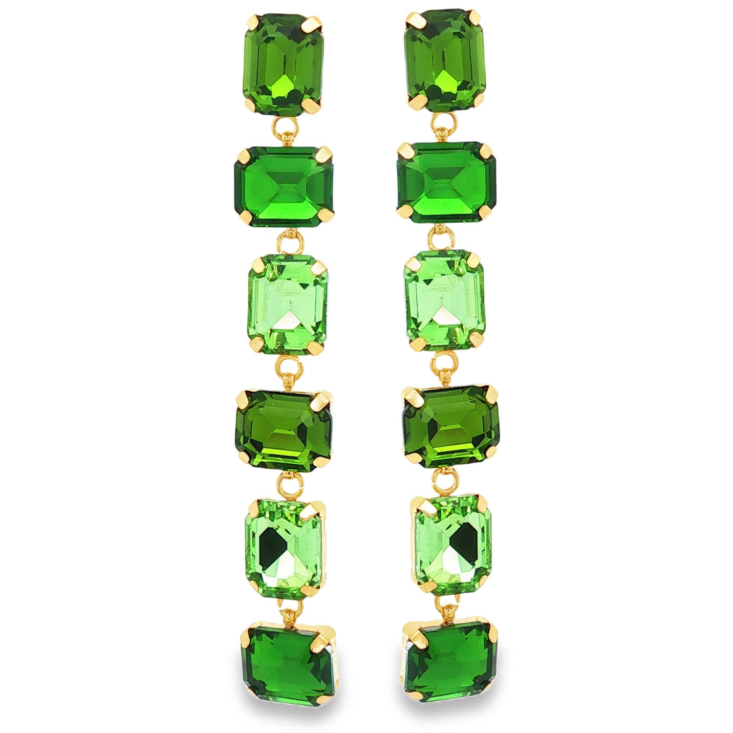 Apportez une touche de sophistication vibrante à votre allure avec ces magnifiques boucles d'oreilles pendantes. Alliant la robustesse de l'acier à l'éclat luxueux des cristaux, ce bijou est une véritable déclaration de style.<br/>Ces boucles se distinguent par leur structure verticale composée de six cristaux rectangulaires taillés en facettes. L'alternance de nuances — allant d'un vert forêt profond à un vert péridot lumineux — crée un jeu de lumière captivant et un effet de dégradé subtil.<br/>Chaque pierre est délicatement maintenue par un serti à quatre griffes en acier doré, offrant un contraste chaud et luxueux avec la froideur cristalline des pierres. Pendantes Rectangle Adolescent Adulte Femme Fille Indémodable Apportez une touche de sophistication vibrante à votre allure avec ces magnifiques boucles d'oreilles pendantes. Alliant la robustesse de l'acier à l'éclat luxueux des cristaux, ce bijou est une véritable déclaration de style.<br/>Ces boucles se distinguent par leur structure verticale composée de six cristaux rectangulaires taillés en facettes. L'alternance de nuances — allant d'un vert forêt profond à un vert péridot lumineux — crée un jeu de lumière captivant et un effet de dégradé subtil.<br/>Chaque pierre est délicatement maintenue par un serti à quatre griffes en acier doré, offrant un contraste chaud et luxueux avec la froideur cristalline des pierres. Pendantes Rectangle Adolescent Adulte Femme Fille Indémodable