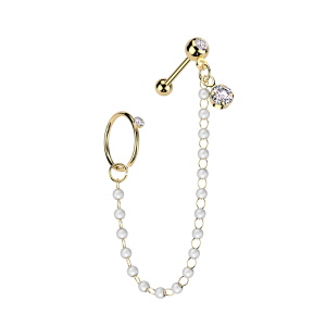 Boucle d'oreille composée d'une créole en acier chirurgical 316L doré surmontée d'un oxyde de zirconium blanc, d'une chaîne de perles, d'un pendant serti griffes d'un oxyde de zirconium blanc et d'un piercing haltère tragus en acier chirurgical 316L doré serti d'un oxyde de zirconium blanc. Vendu à l'unité.