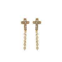 Boucles d'oreilles pendantes composées d'une puce en forme de croix en acier doré pavée de strass et d'une chaîne en acier doré.