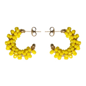 Boucles d'oreilles créoles en acier doré surmontées de perles de couleur jaune.