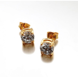 Boucles d'oreilles puces en plaqué or jaune 18 carats serties 4 griffes d'un oxyde de zirconium blanc.