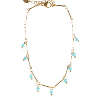 Bracelet chaîne de cheville en acier doré avec pampilles perles bleues. Fermoir mousqueton avec 3 cm de rallonge.