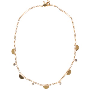 Bracelet de cheville composé d'une chaîne avec des demi pastilles rondes en acier doré et de quatre strass sertis clos. Fermoir mousqueton avec 5 cm de rallonge.