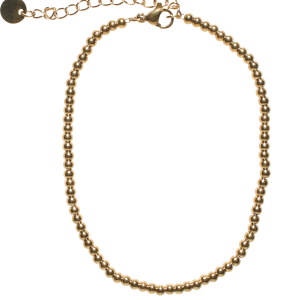 Bracelet chaîne de cheville composée de perles en acier doré. Fermoir mousqueton avec 5 cm de rallonge.