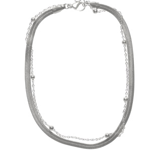 Bracelet chaîne de cheville double rangs composé d'une chaîne maille serpent en acier argenté, ainsi qu'une chaîne avec boules en acier argenté. Fermoir mousqueton avec 5 cm de rallonge.