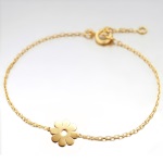 Bracelet avec fleur en plaqué or.