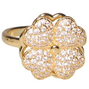 Bague en métal doré avec un trèfle à quatre feuilles rotatif serti de strass. Bague anti stress avec un objet rotatif pour soulager l'anxiété et le stress.