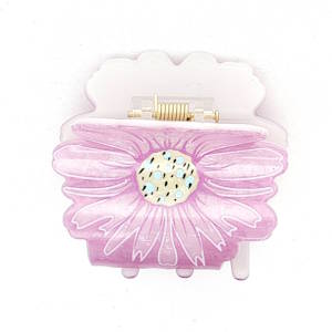 Magnifique pince crabe pour cheveux au motif floral de couleurs vives et brillantes.

