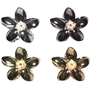 Pince crabe à cheveux en forme de fleur de couleur métallisée surmontée d'une fleur et d'un strass serti griffe. 4 modèles différents. Votre préférence en commentaire.