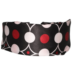 Serre-tête pour cheveux recouverts de textile satiné avec motifs.