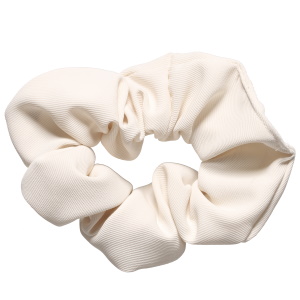 Chouchou élastique pour cheveux en textile de couleur blanche.