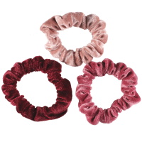 Lot de 3 chouchous élastiques pour cheveux en textile velours de couleurs différentes.