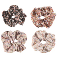 Chouchou élastique pour cheveux en textile de couleur avec motifs de fleurs. 4 coloris différents. Vendu à l'unité, votre préférence en commentaire.