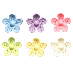 Pince pour cheveux en forme de fleur en plastique multicolore sertie de strass. 6 coloris différents. Vendu à l'unité. Votre préférence en commentaire.